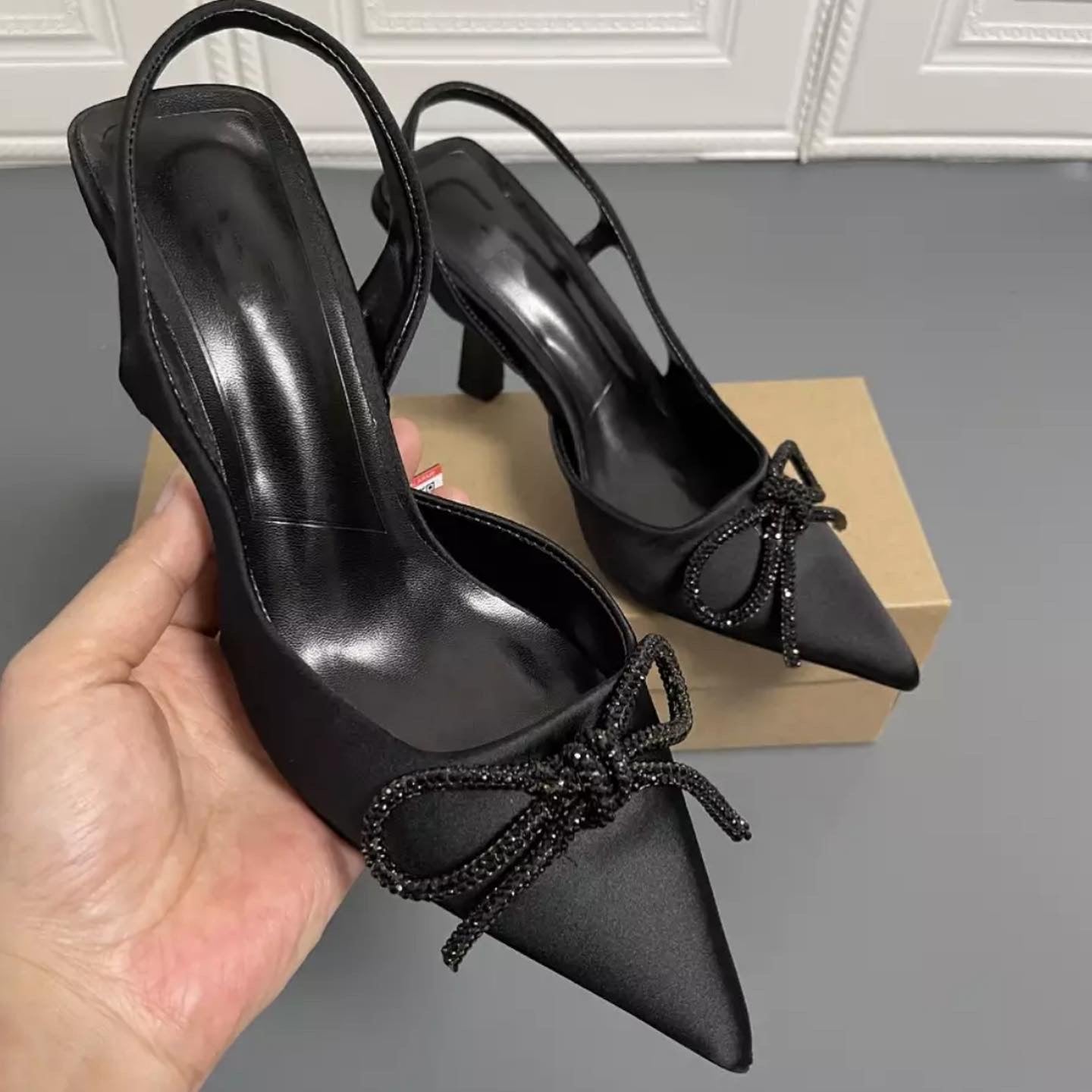 Black bow heels